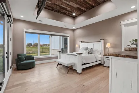 a bed room with a bed and a couch