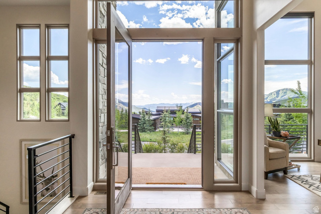 140 West Vista Road Kamas, UT 84036 - Photo 17 of 101 Expansive glass entry door with a stone surround, complemented by a tall transom window