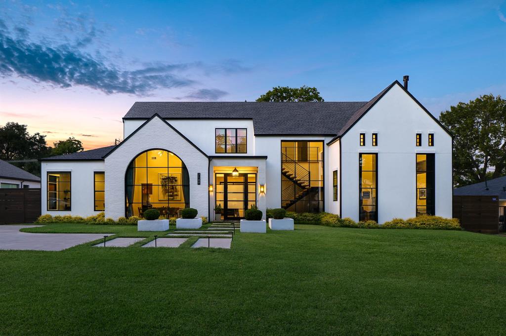 a swimming pool with outdoor seating and yard