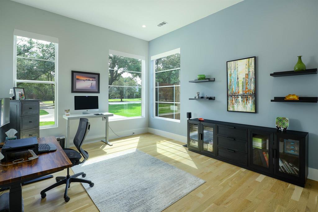 7149 Northaven Road Dallas, TX 75230 - Photo 16 of 25 a view of a workspace with furniture and a window