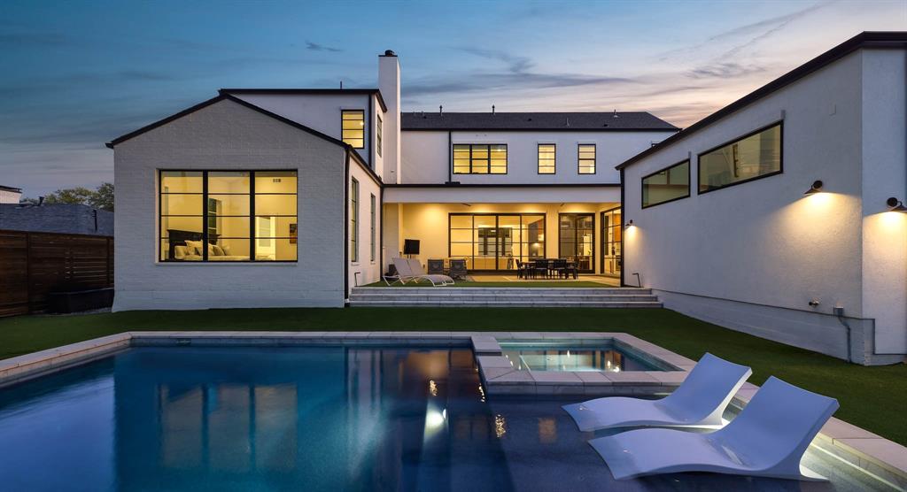 7149 Northaven Road Dallas, TX 75230 - Photo 5 of 25 a living room with furniture and a window