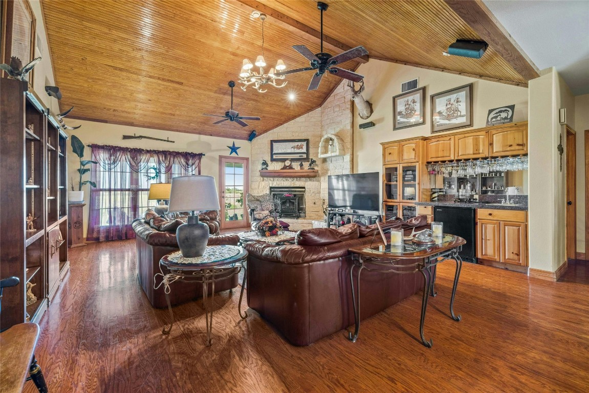 14410 Hero Way West Leander, TX 78641 - Photo 14 of 39 a living room with fireplace furniture and a large window