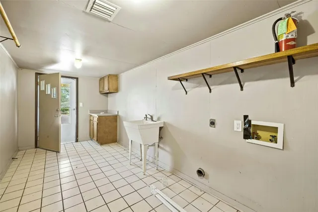 a view of a hallway with seating area