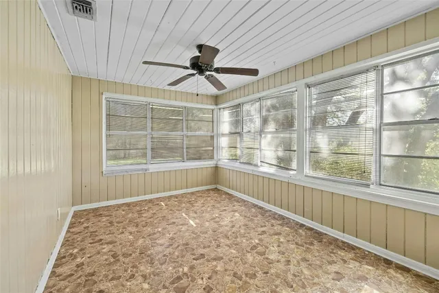 a view of an empty room and window