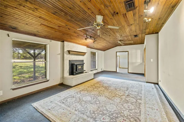 a view of entryway with a fireplace