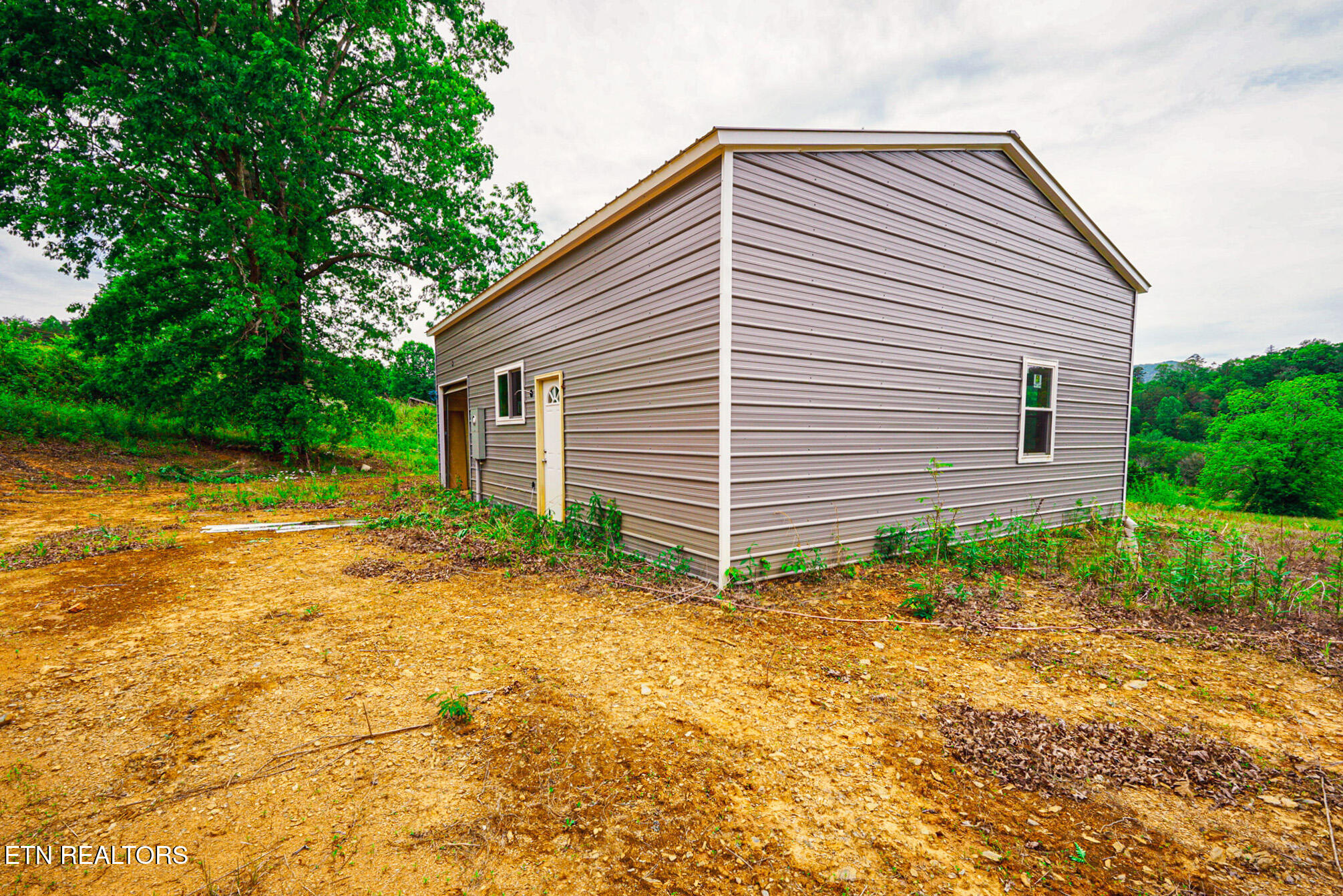 336 Carruth Road Turtletown, TN 37391 - Photo 6 of 26 Back and Left of House