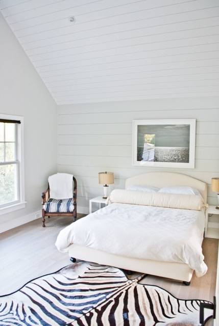 Undisclosed Address Bridgehampton, NY 11932 - Photo 11 of 19 a bedroom with a bed and window