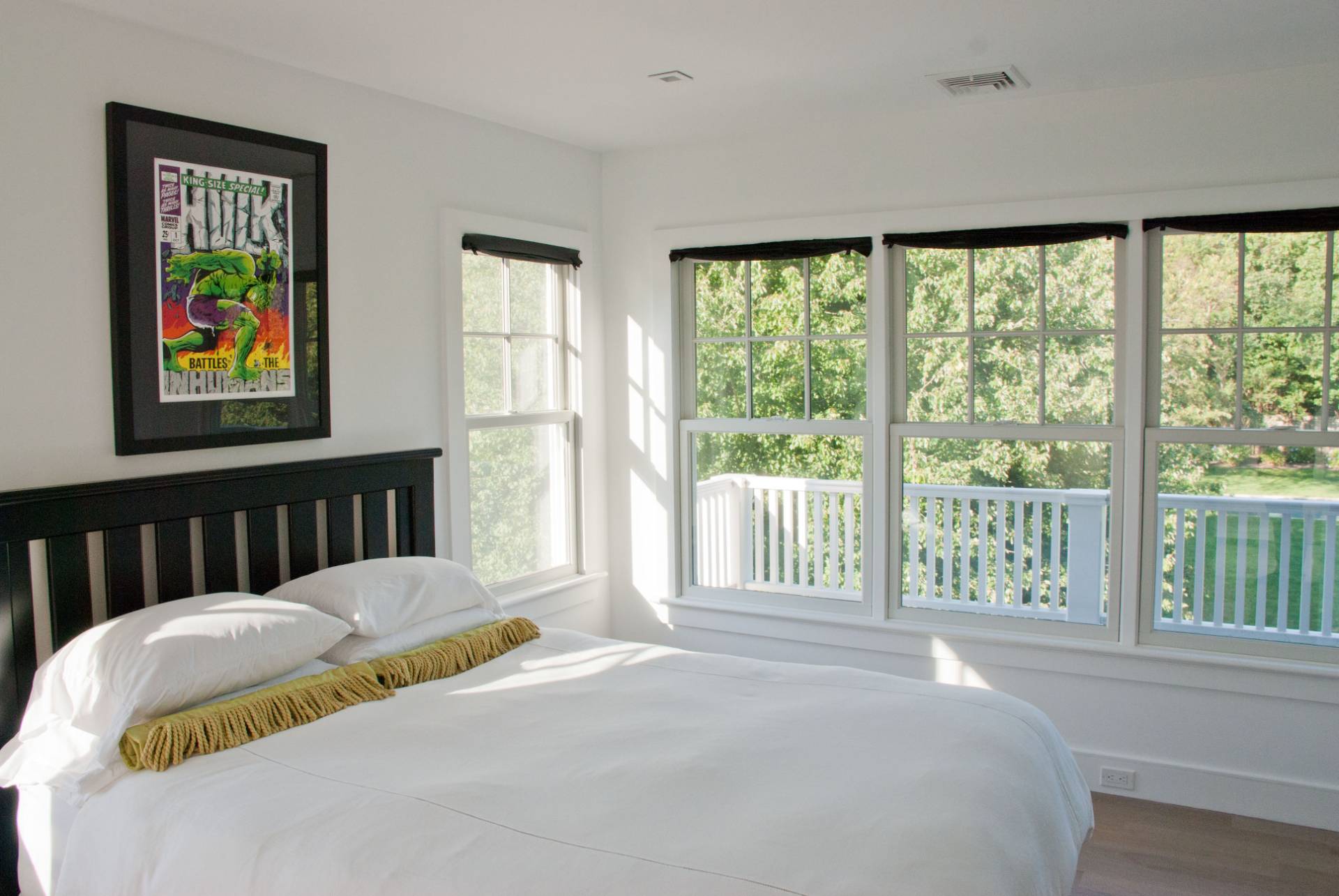 Undisclosed Address Bridgehampton, NY 11932 - Photo 12 of 19 a bed sitting in a bedroom next to a window