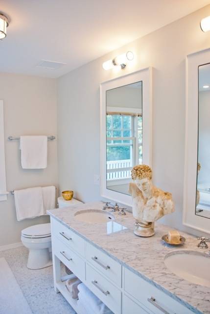 Undisclosed Address Bridgehampton, NY 11932 - Photo 16 of 19 a bathroom with a granite countertop sink mirror vanity and toilet