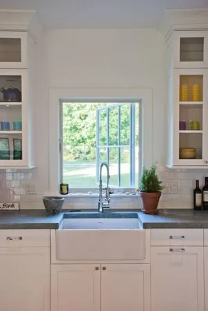 a kitchen with sink and window