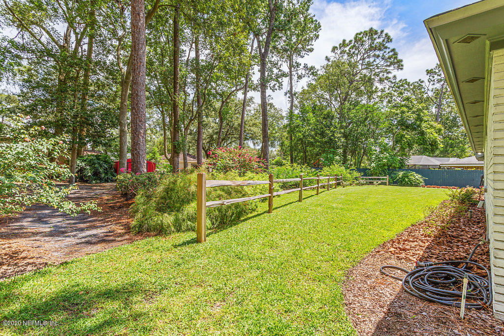 9625 Beauclerc Bluff Road Jacksonville, FL 32257 - Photo 30 of 30 a view of a backyard with swimming pool