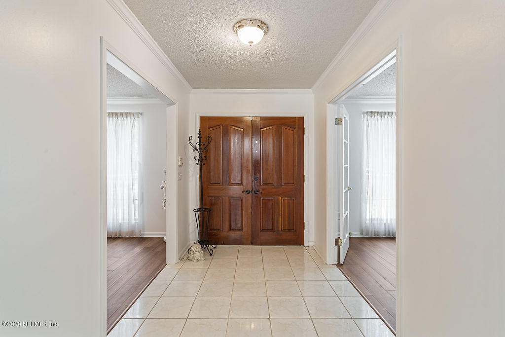 9625 Beauclerc Bluff Road Jacksonville, FL 32257 - Photo 4 of 30 a view of an entryway door