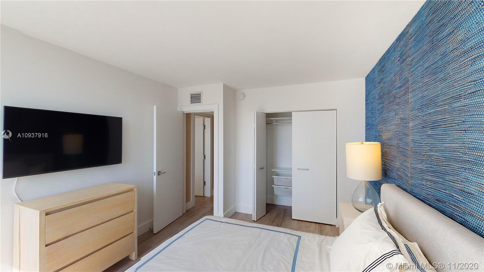 West Avenue Miami Beach, FL 33139 - Photo 16 of 29 a view of living room with furniture and flat screen tv