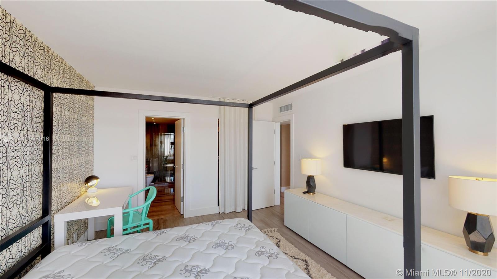 West Avenue Miami Beach, FL 33139 - Photo 21 of 29 a bathroom with a tub and a shower