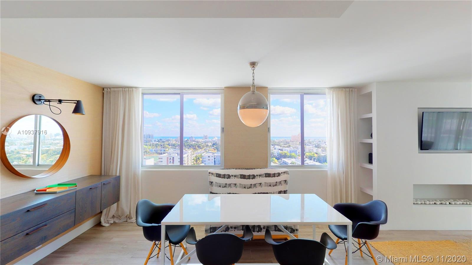 West Avenue Miami Beach, FL 33139 - Photo 6 of 29 a view of a dining room with furniture and a window