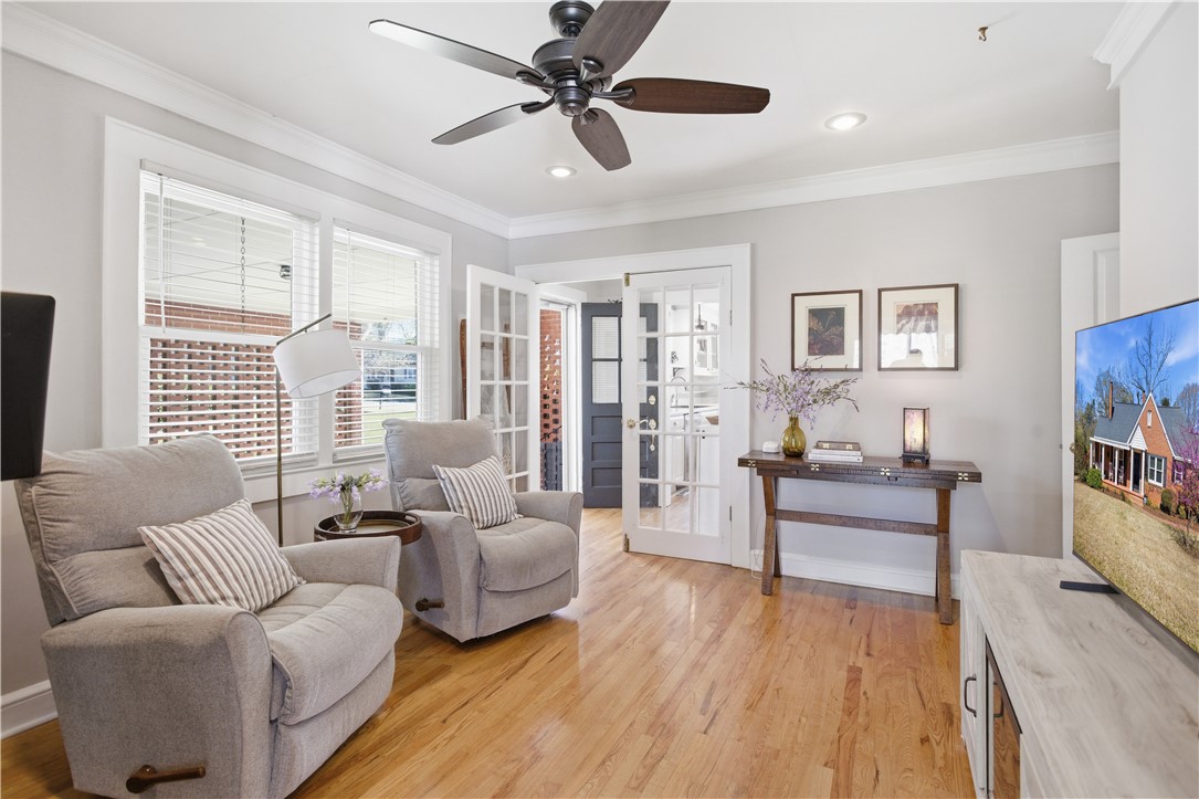 310 Retreat Street Westminster, SC 29693 - Photo 20 of 46 This bright living space features elegant French doors and warm wood flooring.
