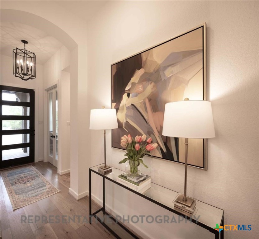 620 High Summit Drive Georgetown, TX 78628 - Photo 12 of 28 a living room with furniture and a lamp