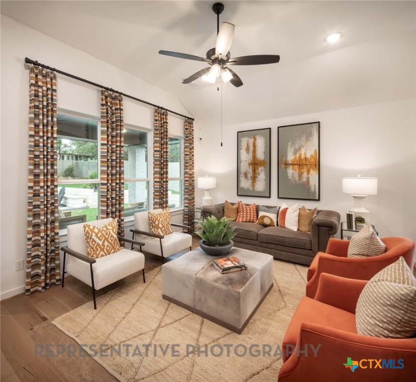 620 High Summit Drive Georgetown, TX 78628 - Photo 21 of 28 a living room with furniture and a large window
