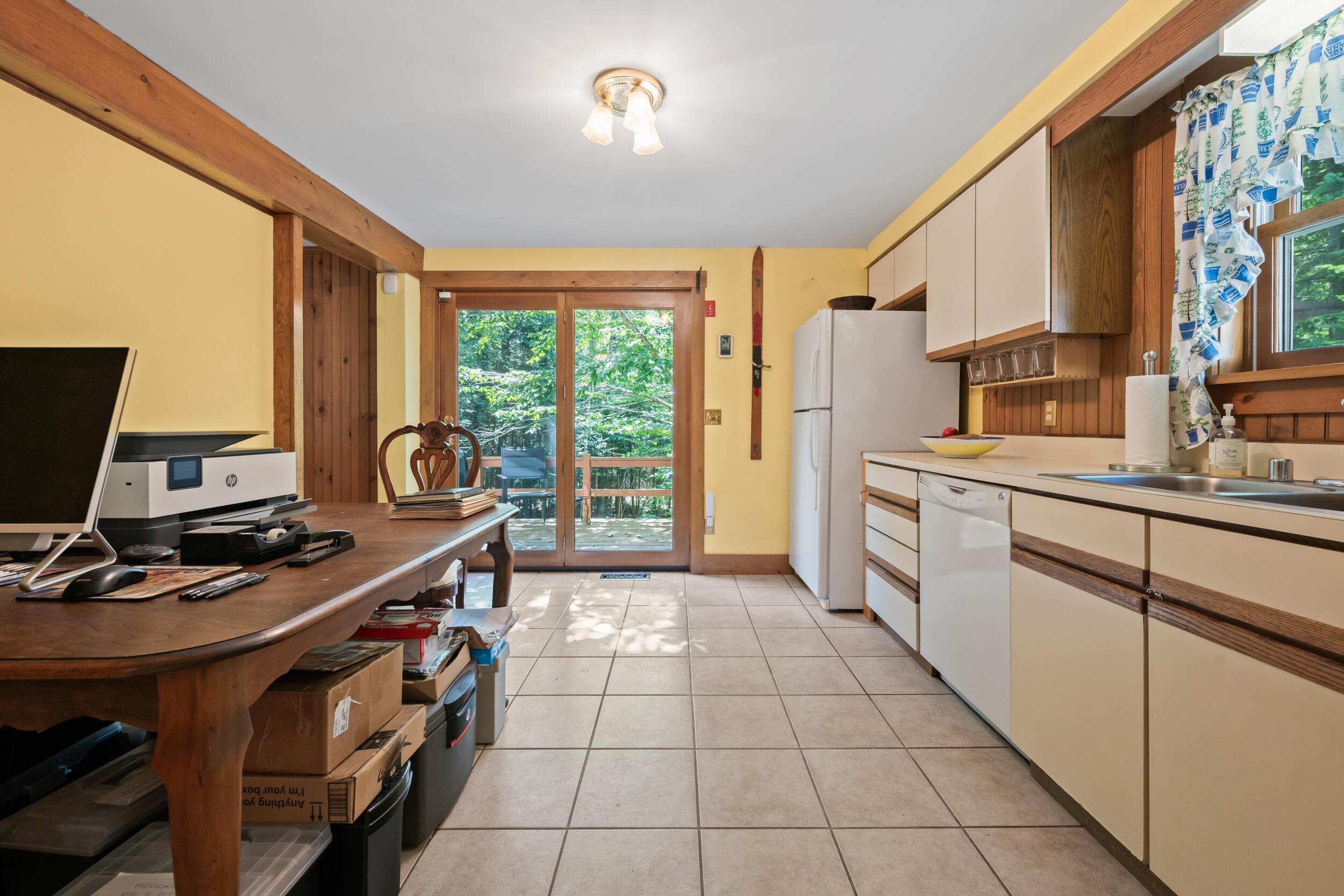 378 Mingo Loop Road Rangeley, ME 04970 - Photo 26 of 62 Kitchen Door Out to Dec