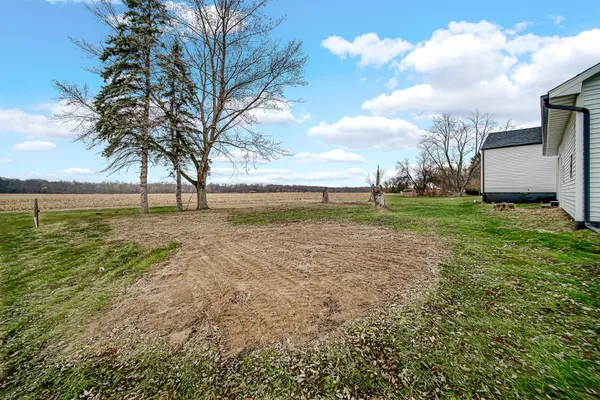 a view of a field with a yard