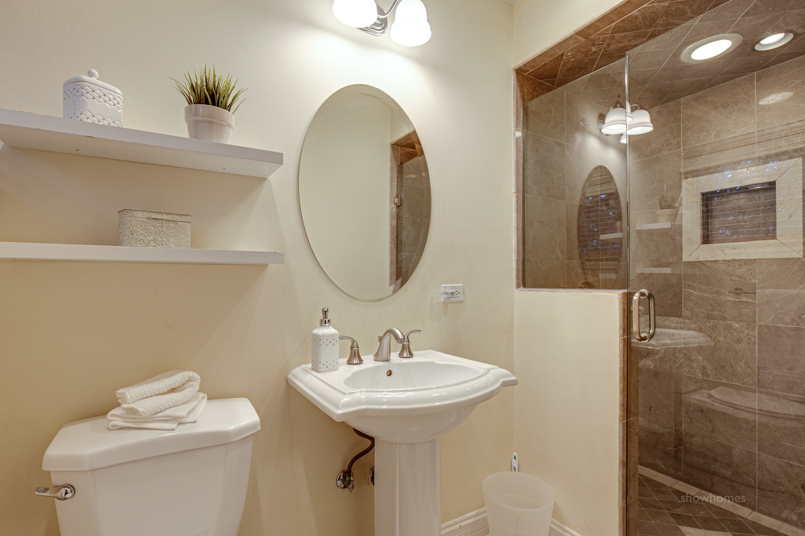 485 East Westleigh Road Lake Forest, IL 60045 - Photo 11 of 22 a bathroom with a sink a toilet and a mirror