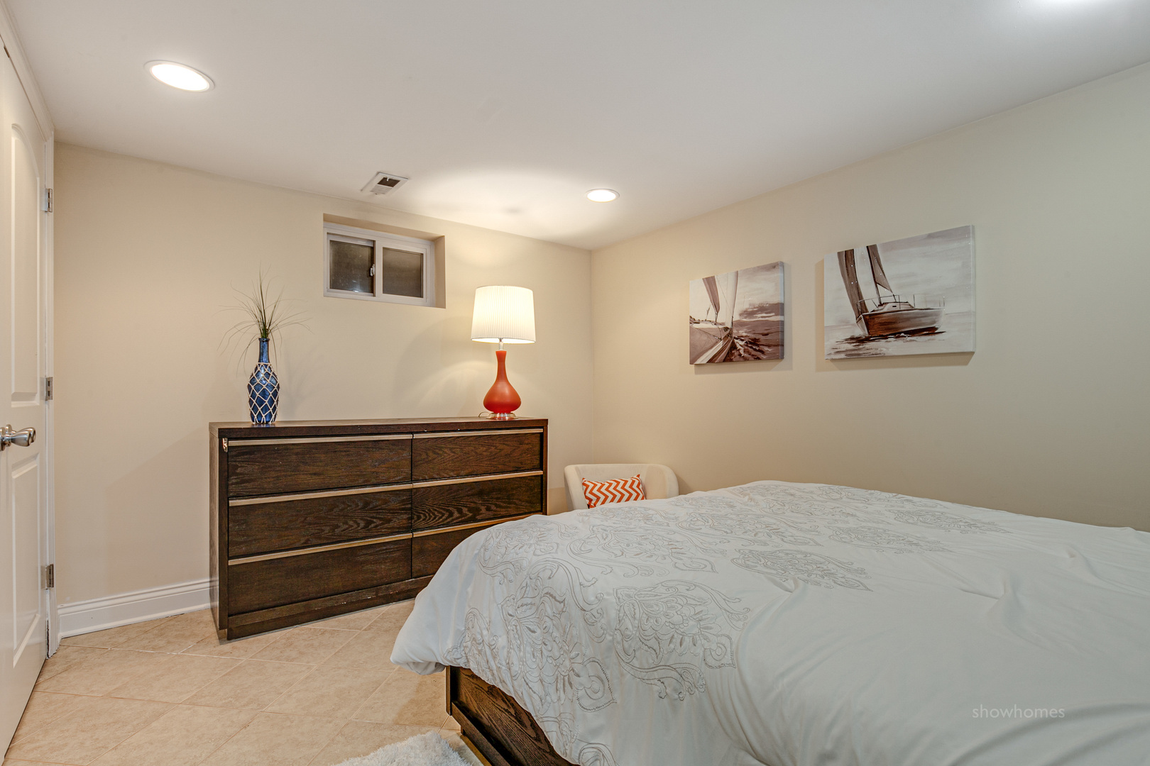 485 East Westleigh Road Lake Forest, IL 60045 - Photo 17 of 22 a bedroom with a bed and a cabinets