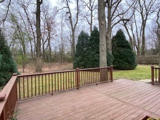 485 East Westleigh Road Lake Forest, IL 60045 - Photo 19 of 22 a balcony with wooden floor and trees