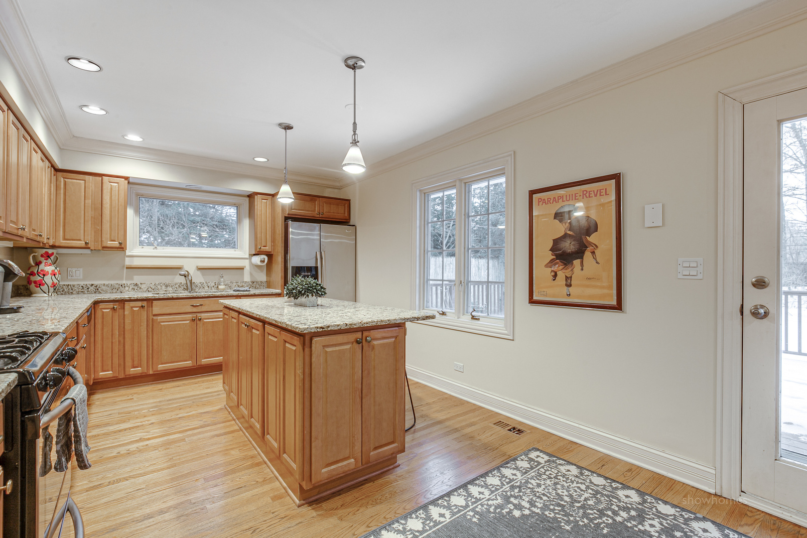 485 East Westleigh Road Lake Forest, IL 60045 - Photo 8 of 22 a kitchen with stainless steel appliances granite countertop a stove a sink dishwasher and a refrigerator with wooden floor