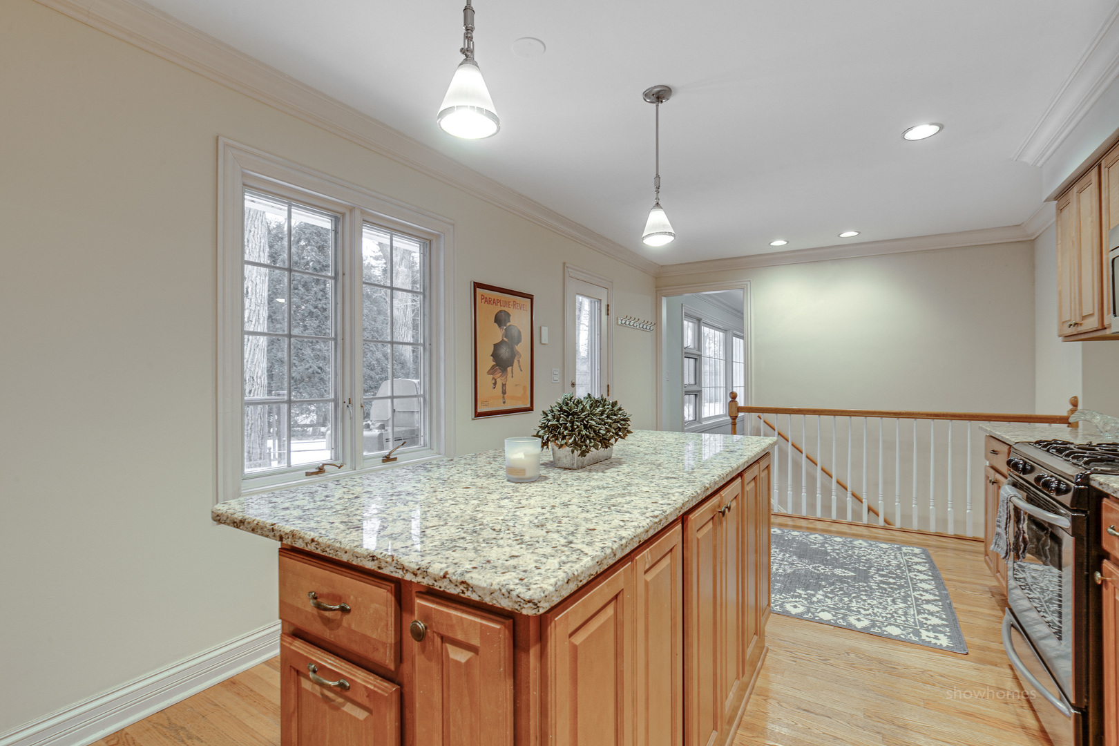 485 East Westleigh Road Lake Forest, IL 60045 - Photo 9 of 22 a kitchen with granite countertop kitchen island stainless steel appliances a table and chairs in it