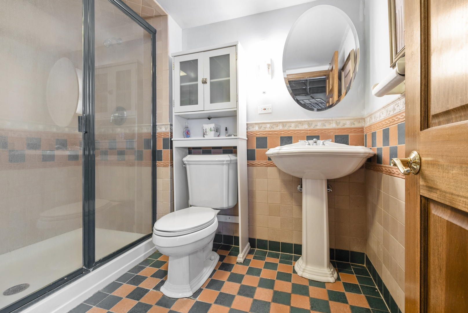 739 Aberdeen Drive Crete, IL 60417 - Photo 17 of 35 a bathroom with a sink a mirror a toilet and a shower