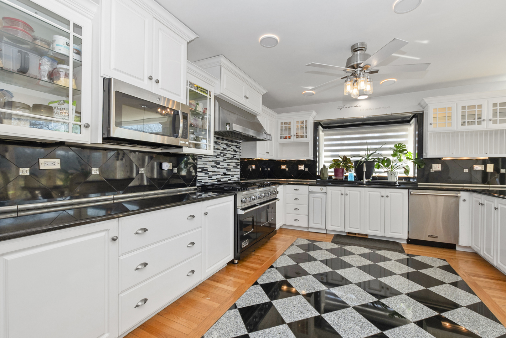 739 Aberdeen Drive Crete, IL 60417 - Photo 6 of 35 a kitchen with stainless steel appliances granite countertop a sink and cabinets
