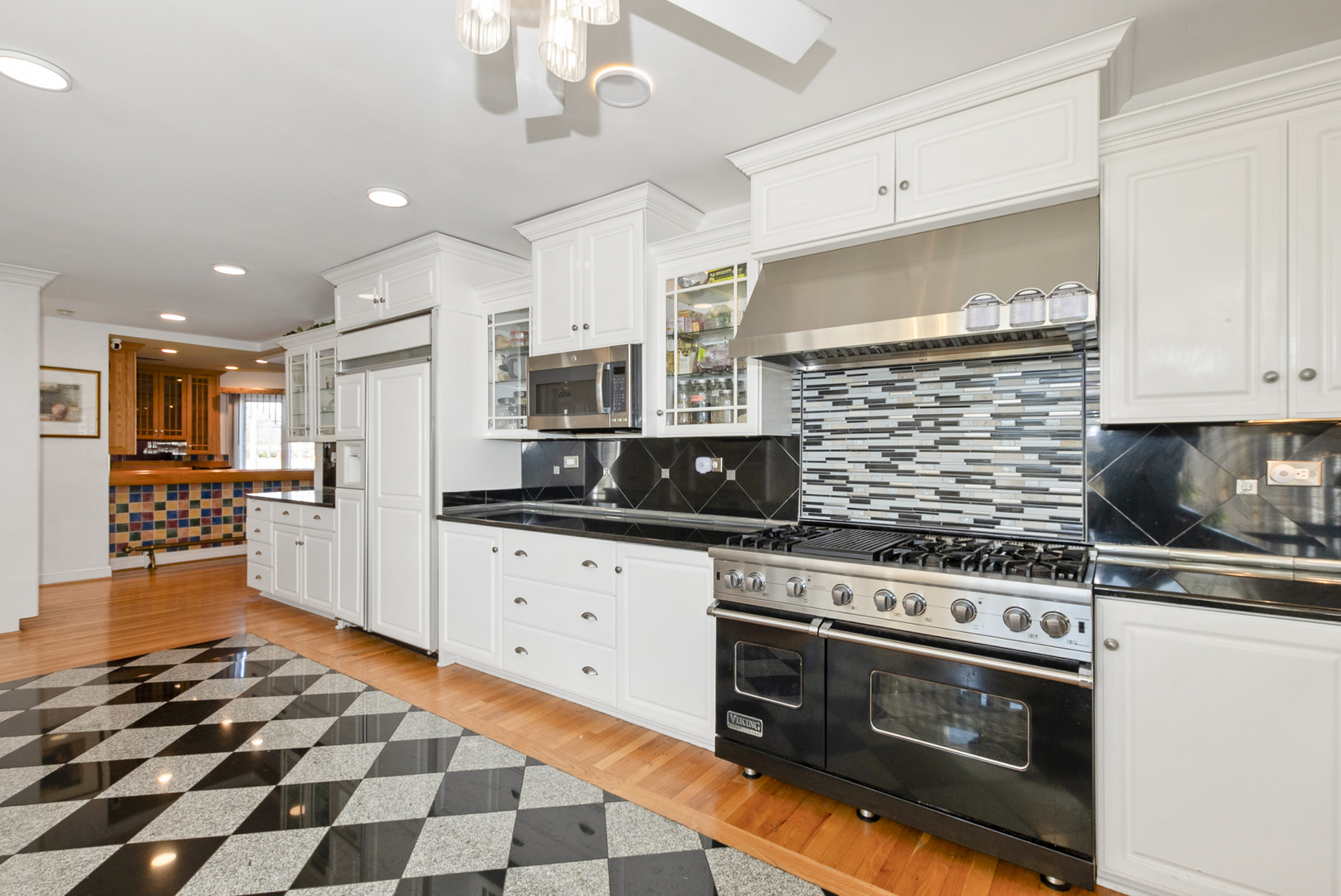 739 Aberdeen Drive Crete, IL 60417 - Photo 7 of 35 a kitchen with stainless steel appliances granite countertop a stove and a sink