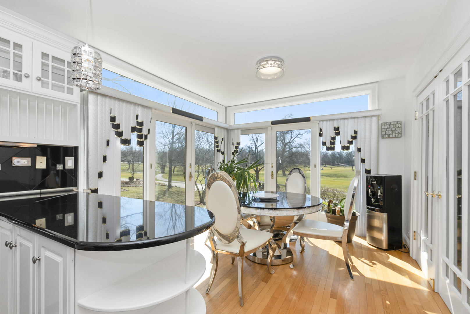 739 Aberdeen Drive Crete, IL 60417 - Photo 8 of 35 a dining room with fireplace furniture and a large window