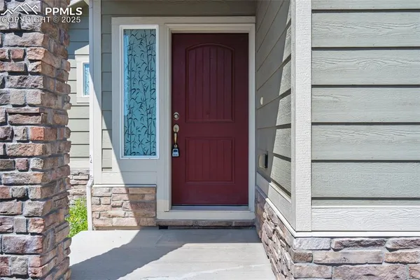 a view of a entryway door of the house