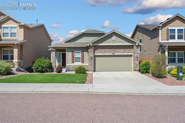 an aerial view of a city with lots of residential buildings