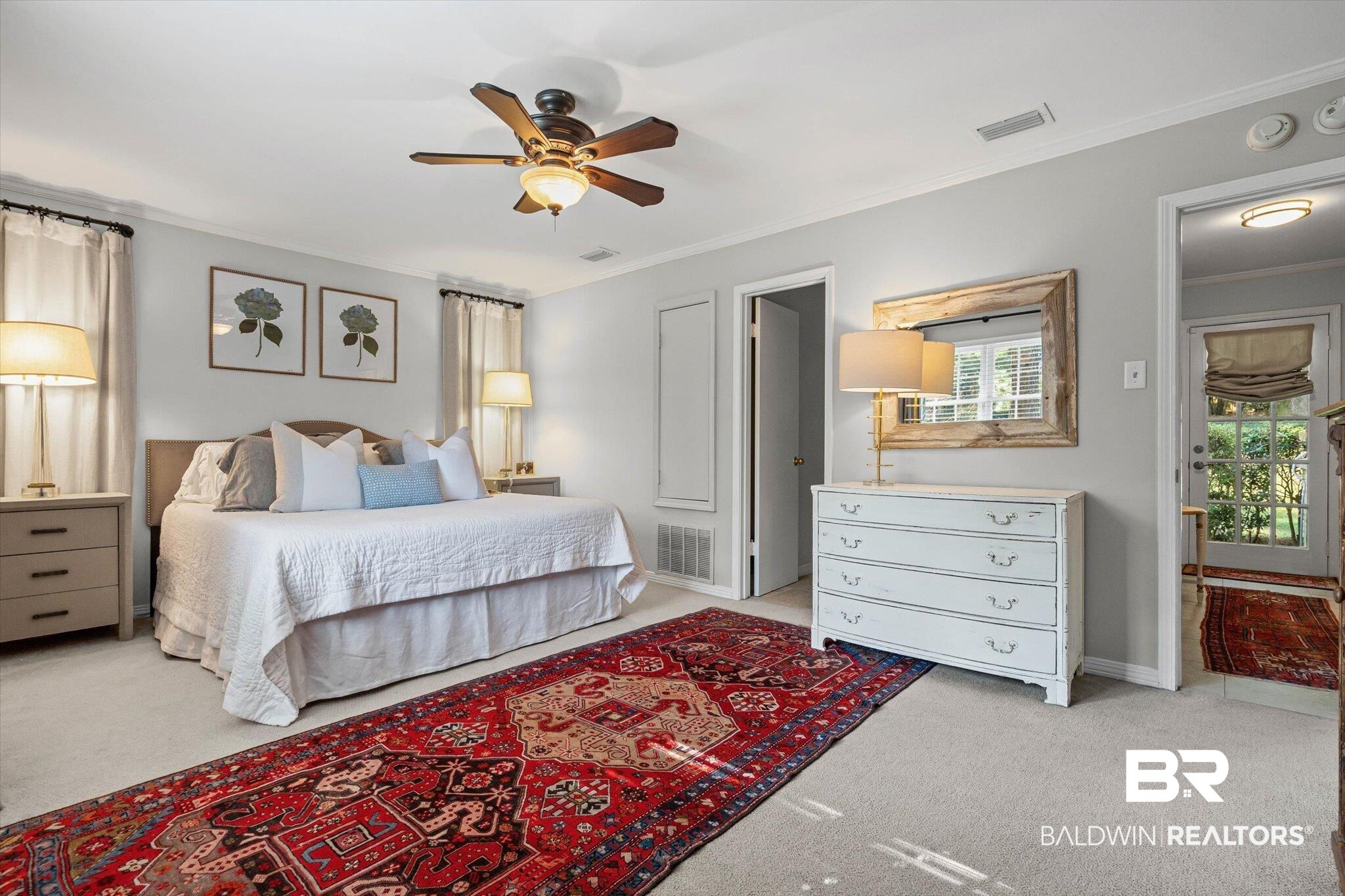 313 Brawood Drive Mobile, AL 36608 - Photo 15 of 32 Bedroom featuring light colored carpet, crown molding, and ceiling fan