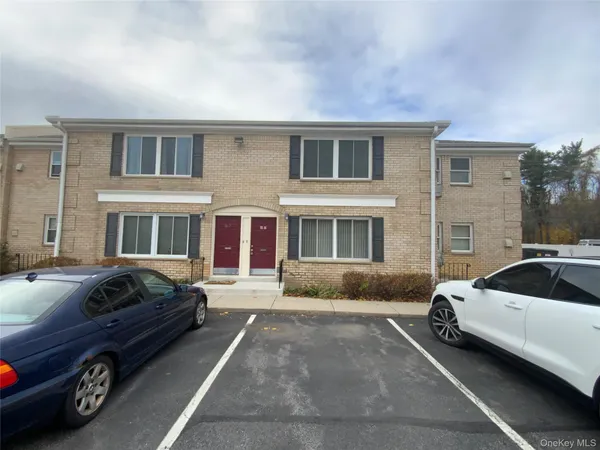 a car parked in front of a house