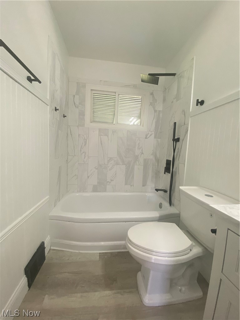 12913 Silver Road Cleveland, OH 44125 - Photo 10 of 23 1st Floor Full bathroom with vanity, tiled shower / bath combo