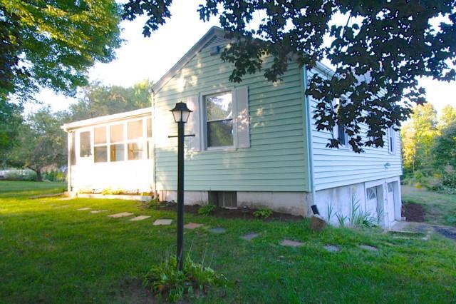 115 Ripton Road Shelton, CT 06484 - Photo 1 of 1 a view of a backyard with plants and large tree