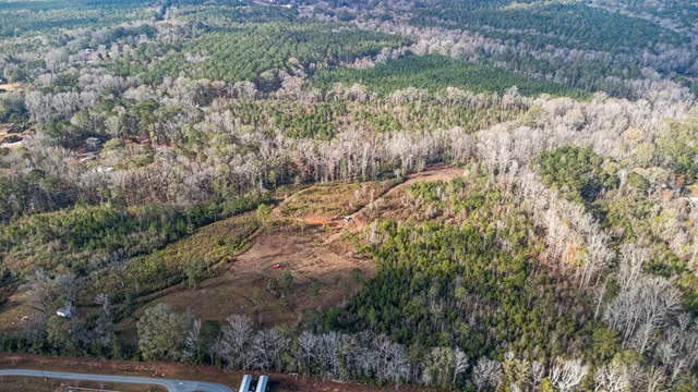 a view of a water fountain in a yard