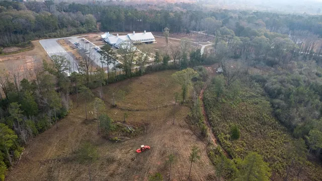 a backyard of a house with lots of green space