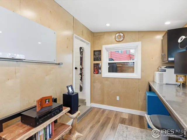 a room with furniture and wooden floor