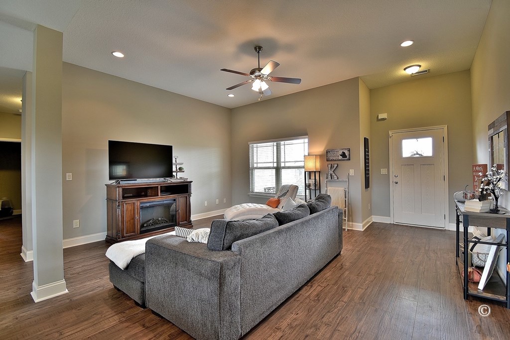 7 Eagle Ridge Lane Fort Mitchell, AL 36856 - Photo 5 of 24 a living room with furniture and a flat screen tv