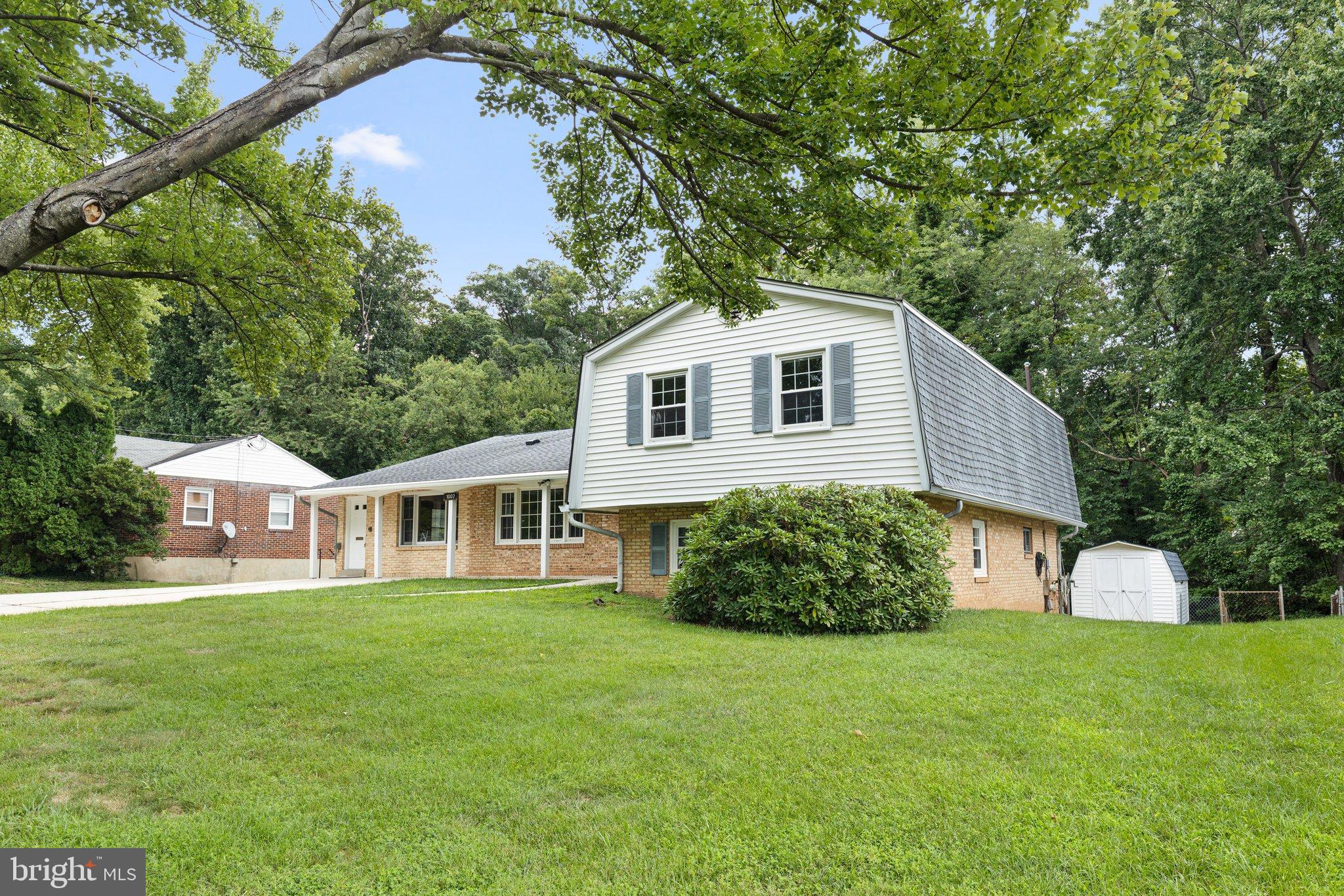 1007 Ruppert Road Silver Spring, MD 20903 - Photo 2 of 47 Charming home nestled in lush greenery.