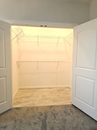a view of a room with an empty space