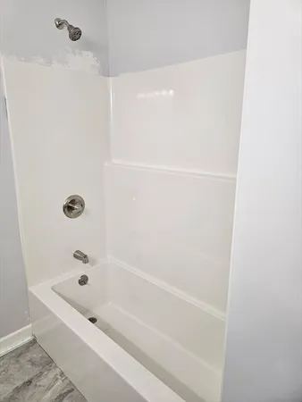 a bathroom with a bathtub