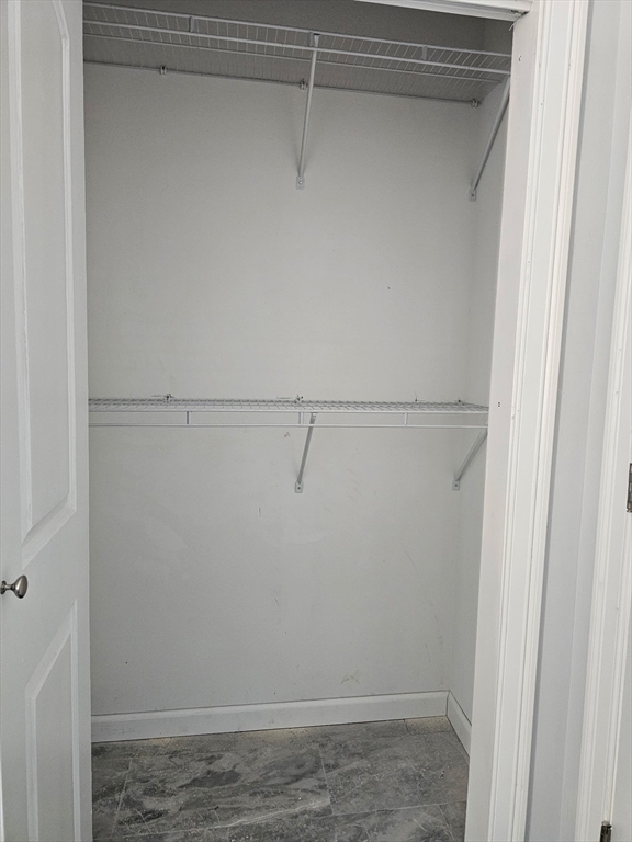 88 Stafford Holland Road Wales, MA 01081 - Photo 20 of 34 a view of a room with racks on the wall