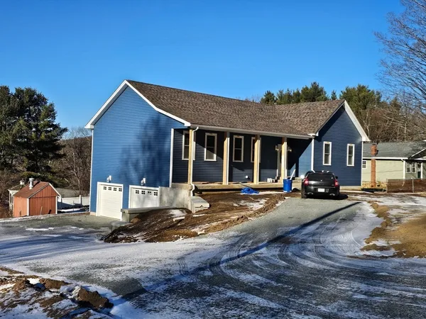 a view of a house with a patio