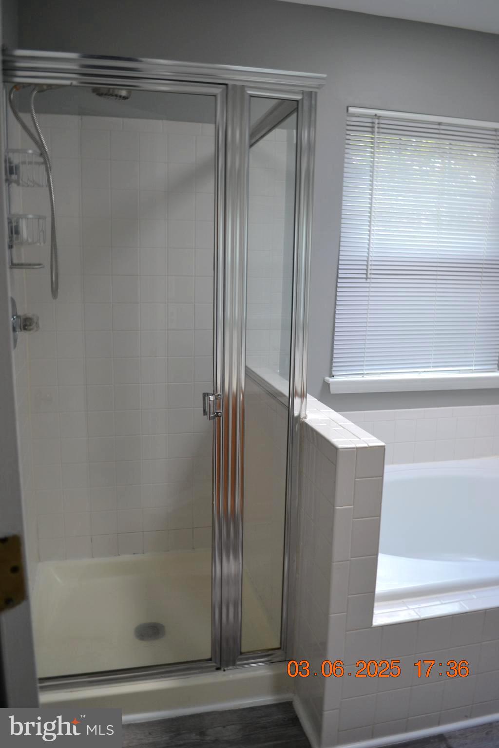 1302 Hill Born Drive Hanover, MD 21076 - Photo 16 of 31 a bathroom with a glass shower door