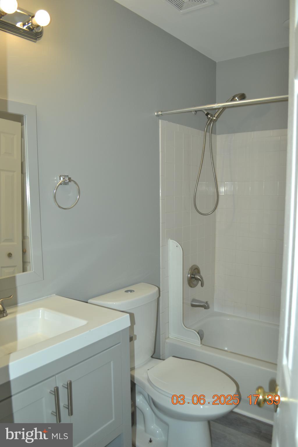 1302 Hill Born Drive Hanover, MD 21076 - Photo 19 of 31 a bathroom with a sink a toilet and shower